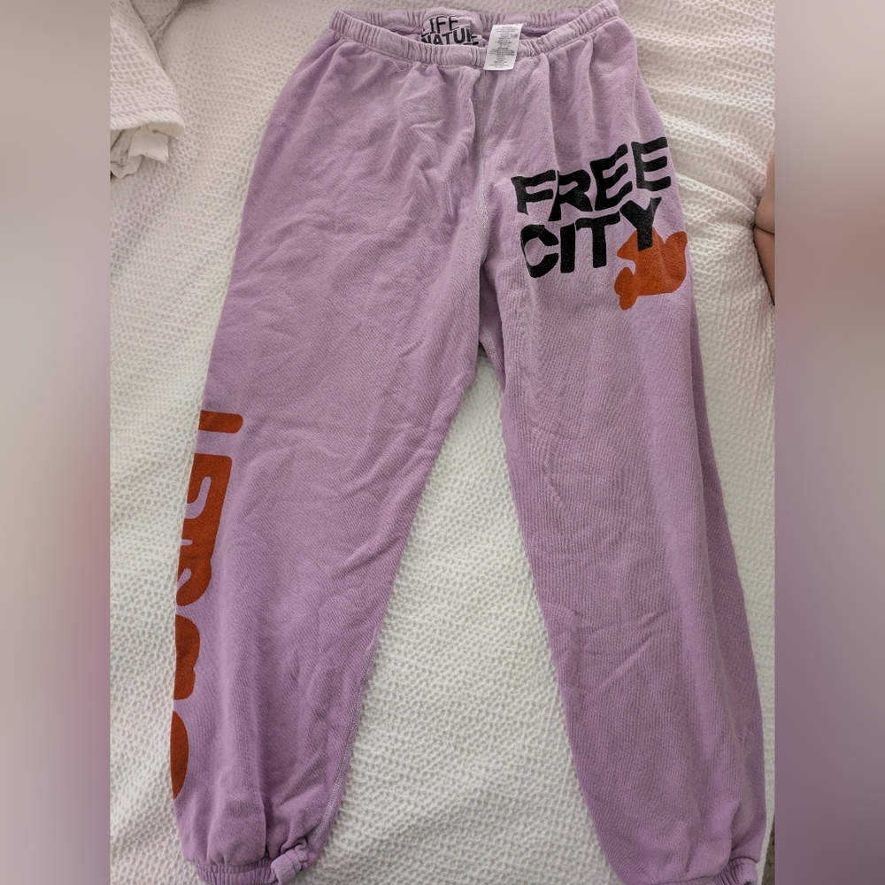 freecity Kids Lilac Joggers with Orange and Black Logo